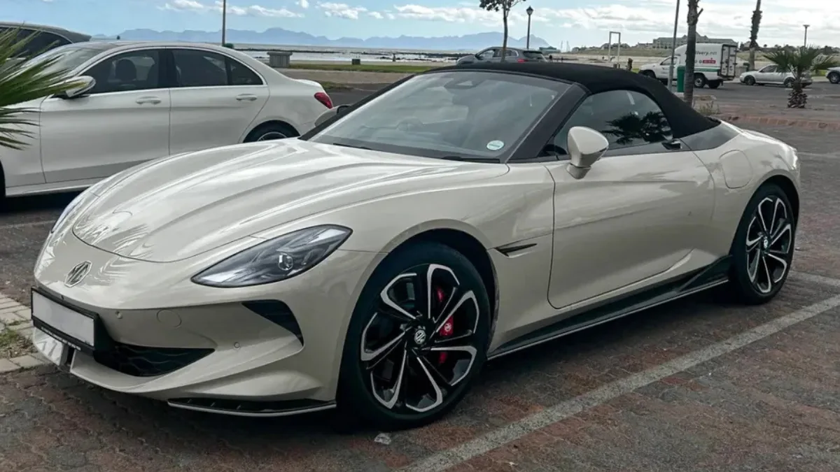 MG Cyberster EV – ₹1,47,719 monthly EMI for 60 months on ₹72 lakh loan at 8.5% interest. Stylish red electric convertible sports car.