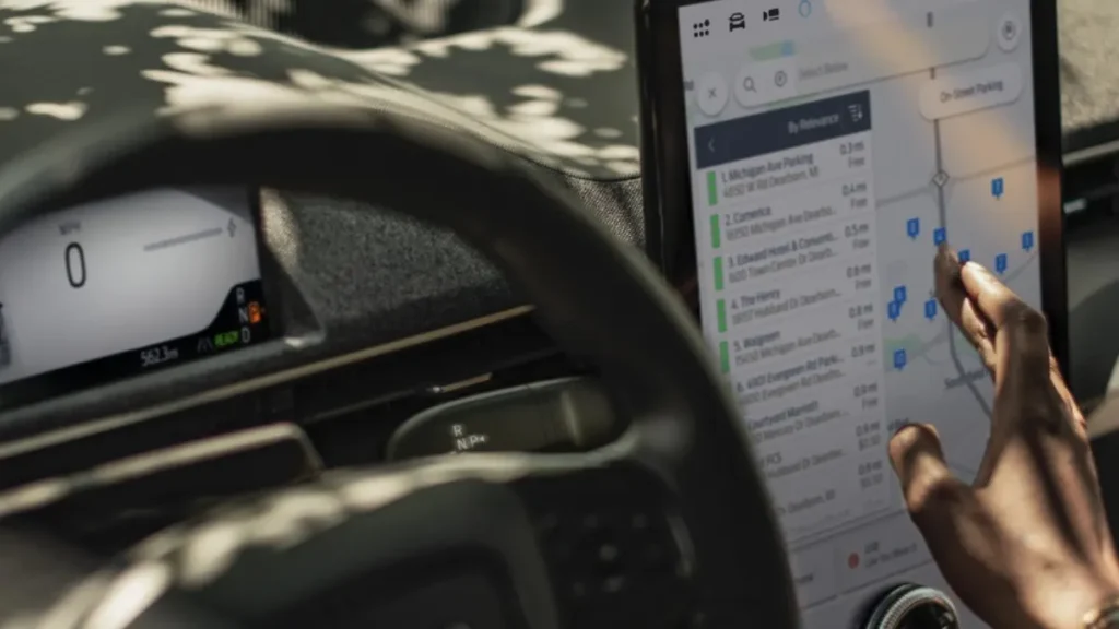 New Ford Mustang Mach-E electric car side profile on road