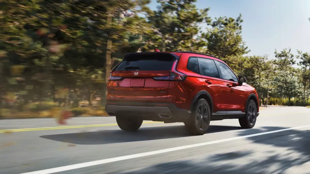 Side view of Honda CR-V showcasing sleek body, LED headlights and sporty wheels