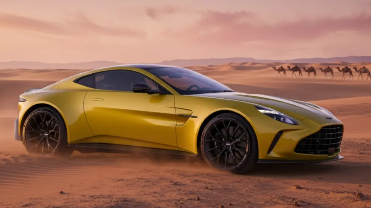 Aston Martin Vantage sports car in sleek metallic finish, showing front and side profile.